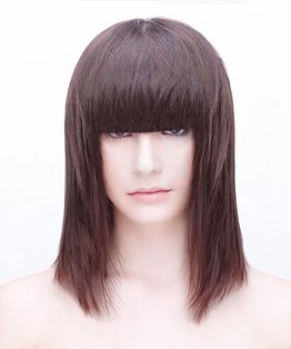 Triangle Layered Haircut Below Shoulders With a Fringe