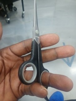 How to hold a pair of scissors